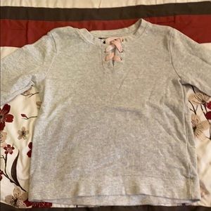 It’s a cute sweater for girls